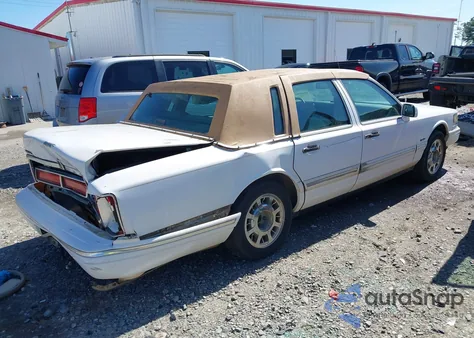 1997 Lincoln Town Car Signature из США, поврежденный, VIN 1LNLM82W8VY709426